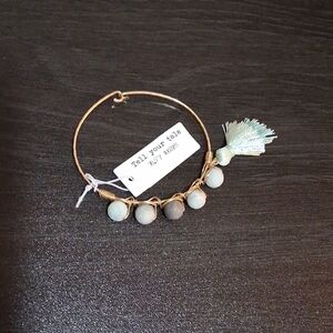 Charming Gold Bracelet with Beads and Tassel